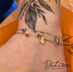 mini charm oro